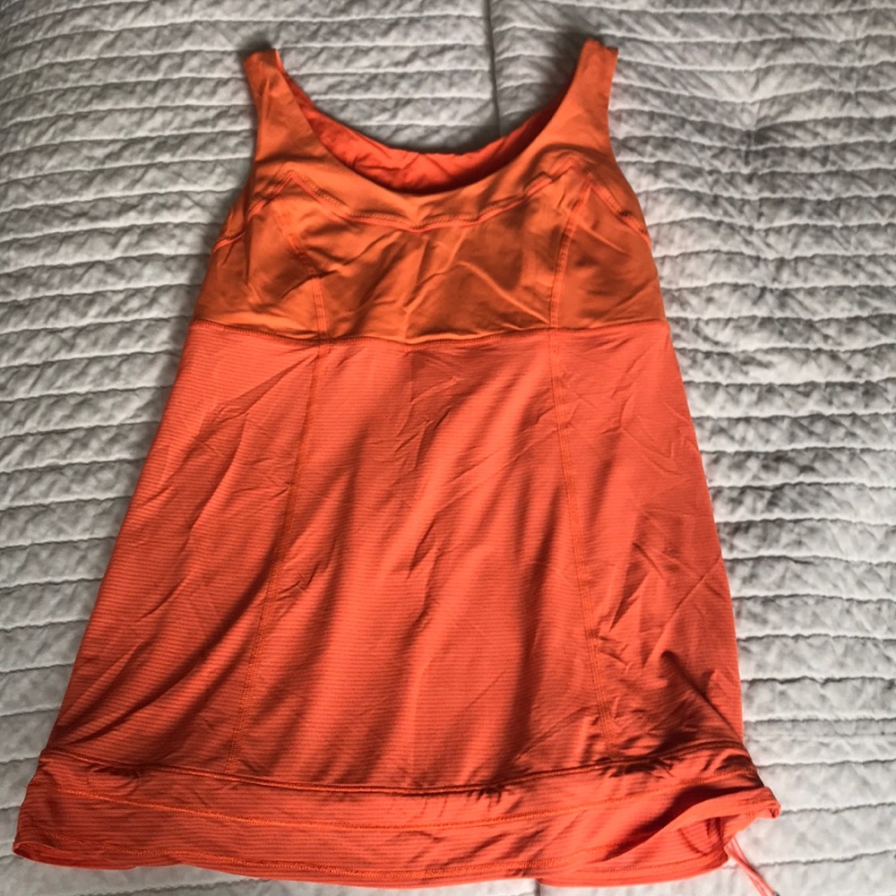 Used orange drawstring Lululemon tank